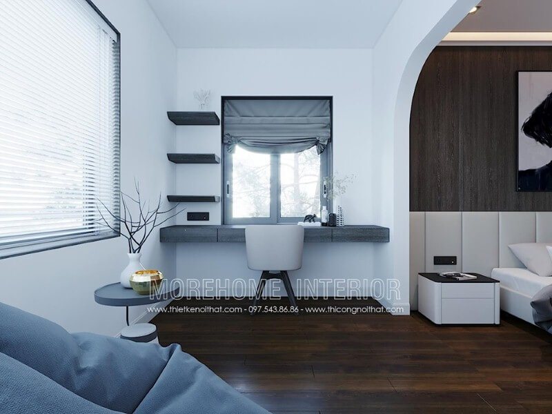 Bàn học gỗ công nghiệp được bố trí cạnh cửa sổ giúp không gian học tập luôn được thông thoáng. Thiết kế phòng ngủ biệt thự