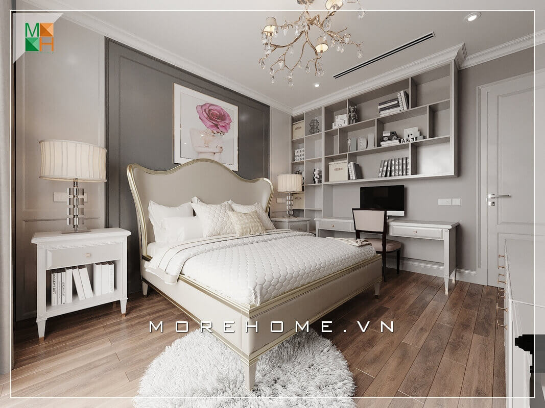 Có lẽ điểm nổi bật nhất trong căn phòng ngủ chung cư đẹp chính là cái giường ngủ mang đậm chất tân cổ điển thiết kế đầu giường uốn lượn mềm mại. Nội thất trong phòng ngủ như kệ giá sách, bàn làm việc, tranh canvas treo đầu giường đến từng chi tiết nhỏ như đèn ngủ hay đèn treo trần tất cả đều sắp xếp rất ngăn nắp và hợp lý. Thiết kế phòng ngủ biệt thự