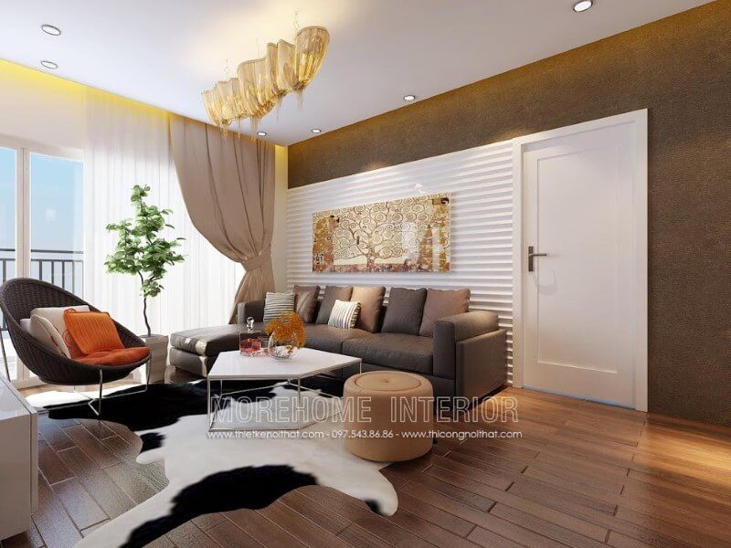 Mẫu bàn trà với thiết kế mặt bàn gỗ công nghiệp, chân inox tạo độ sắc nét cho không gian phòng khách